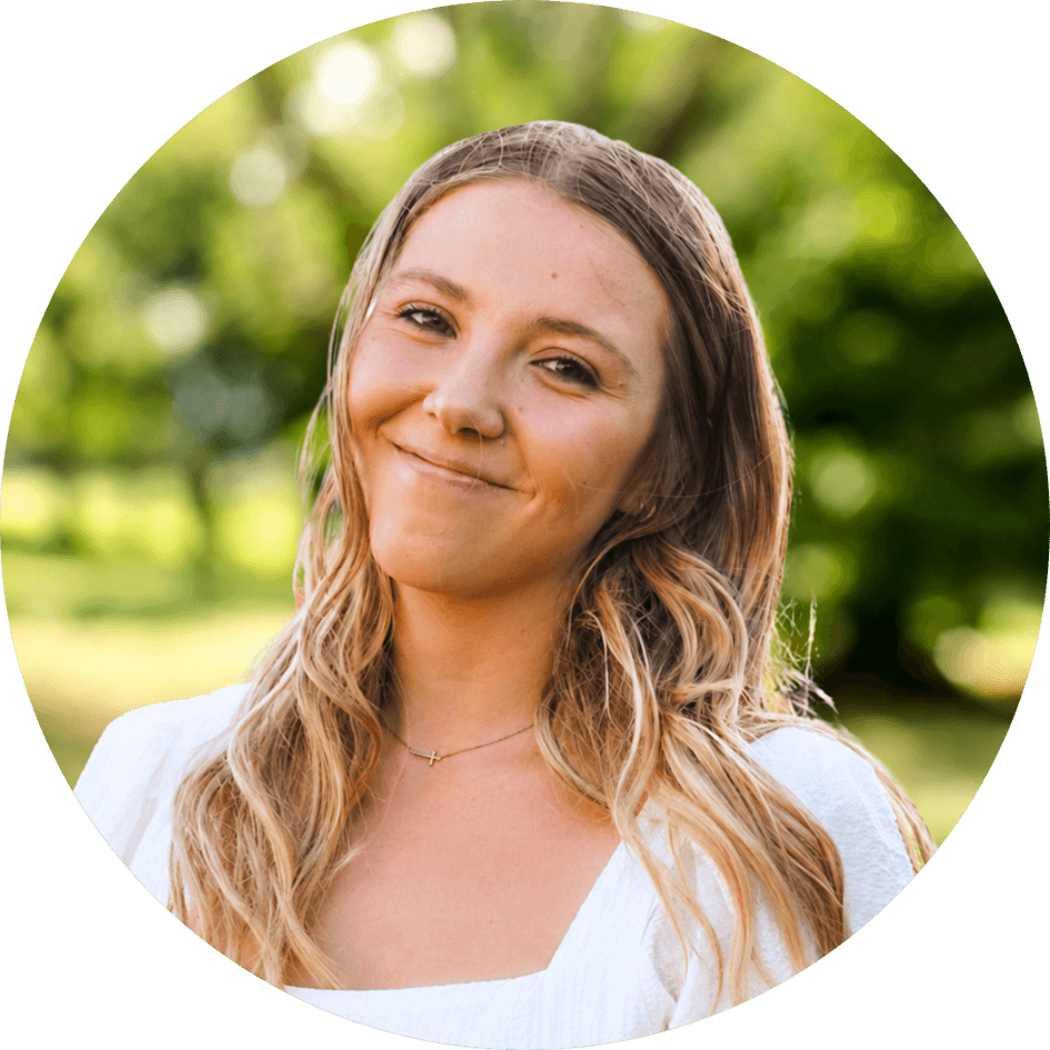 Counselor Daniella Grabau smiles kindly in front of a nature background