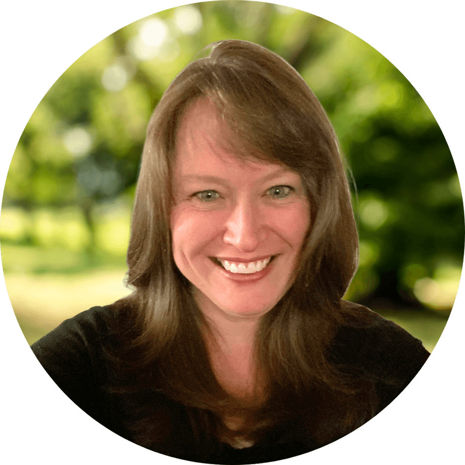 Counselor Kristi Abbott smiles kindly in front of a nature background