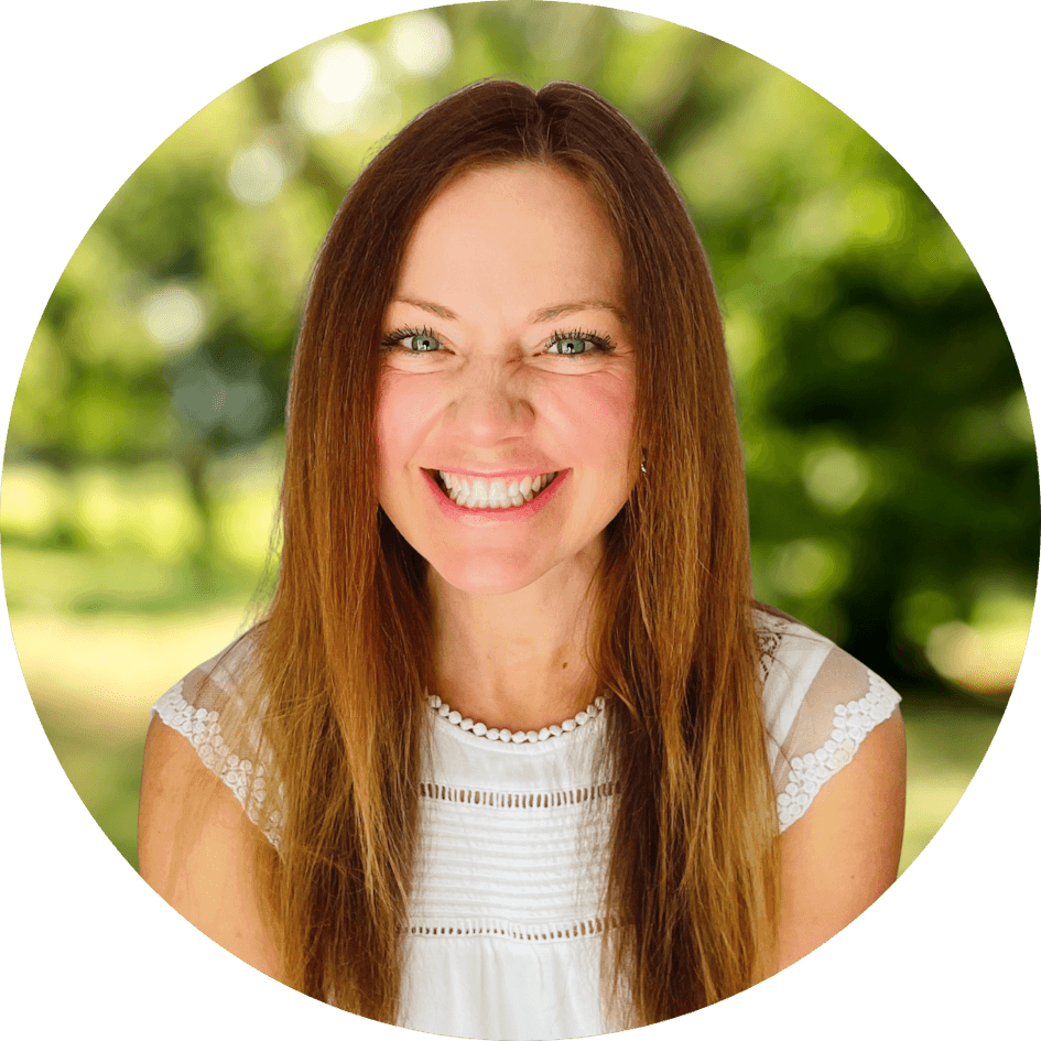 Counselor Mary Mikucki smiles kindly in front of a nature background