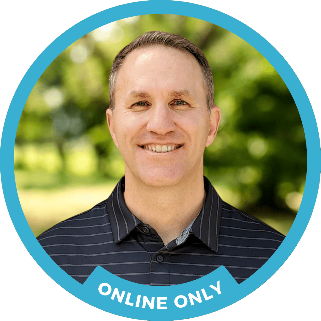 Counselor Patrick Herzer smiles kindly in front of a nature background